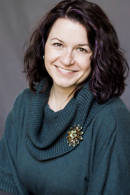 Rayna Diane Hennen teal sweater